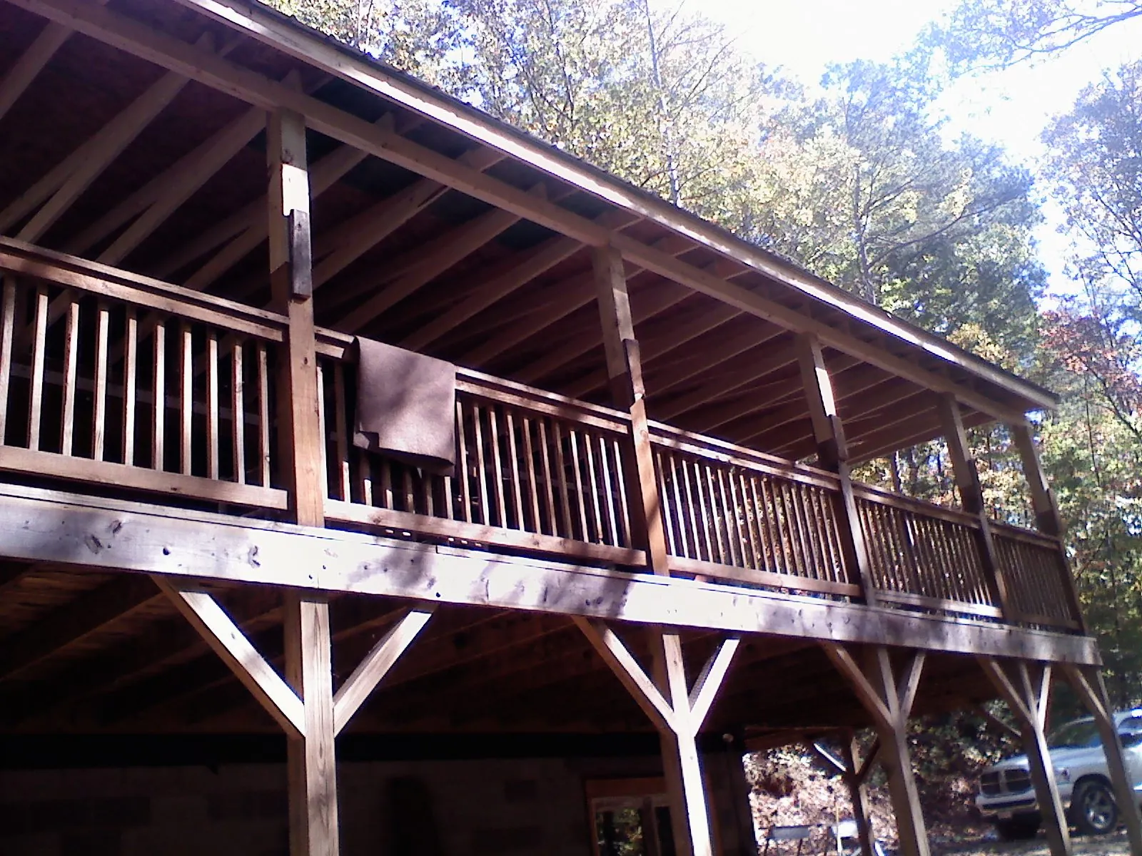Timber framing under a new elevated porch and deck — Roof Leak Repair in Crossnore by Roofing Brothers
